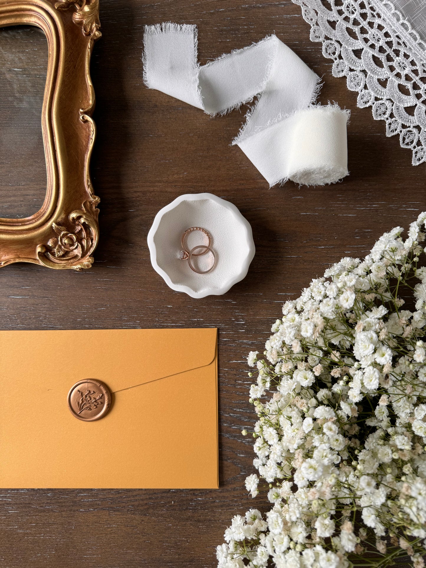 ring dish in flat lay with scalloped edges