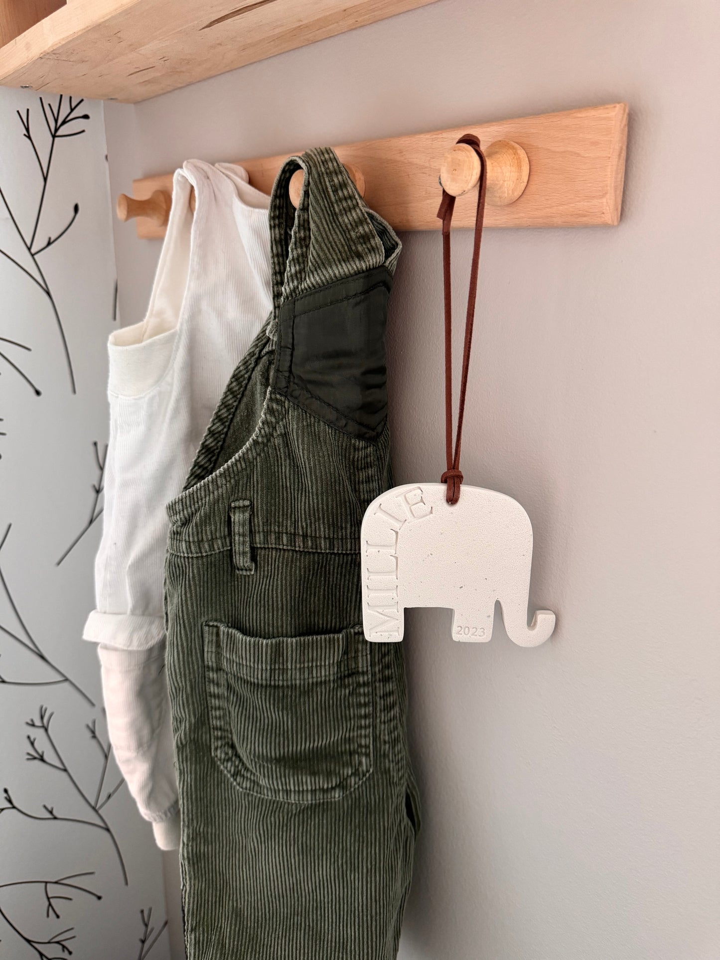 white clay elephant shaped ornament with embossed name, perfect for baby gift