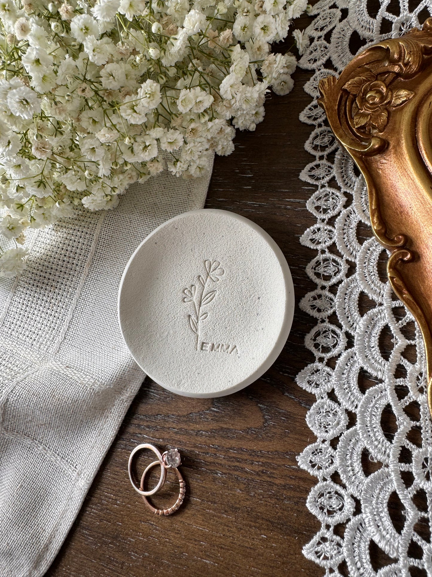 white clay ring dish with personalized name in center with floral design, perfect gift for bride