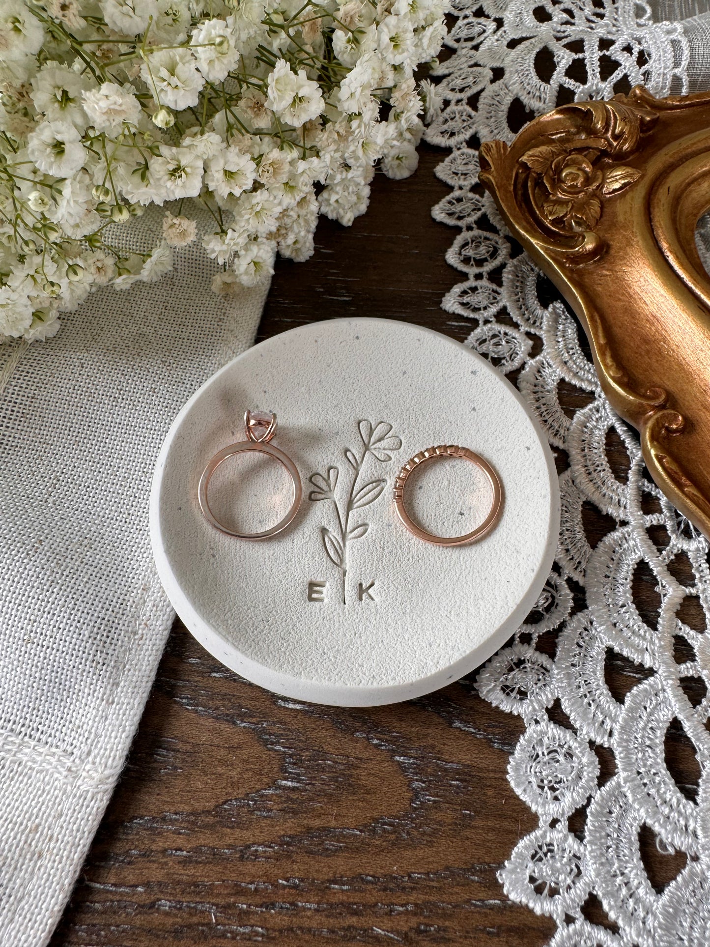 personalized ring dish made of white clay with floral design and initials, perfect couples gift