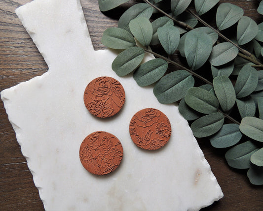 sienna coloured fridge magnet with floral embossed pattern