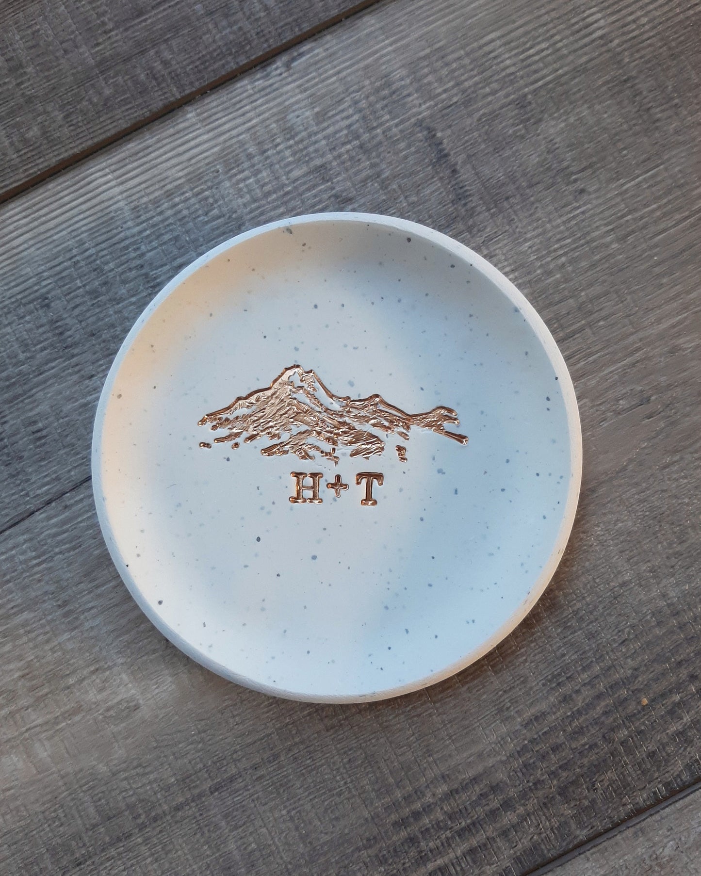 gold foil mountain ring dish with personalized initials for couples