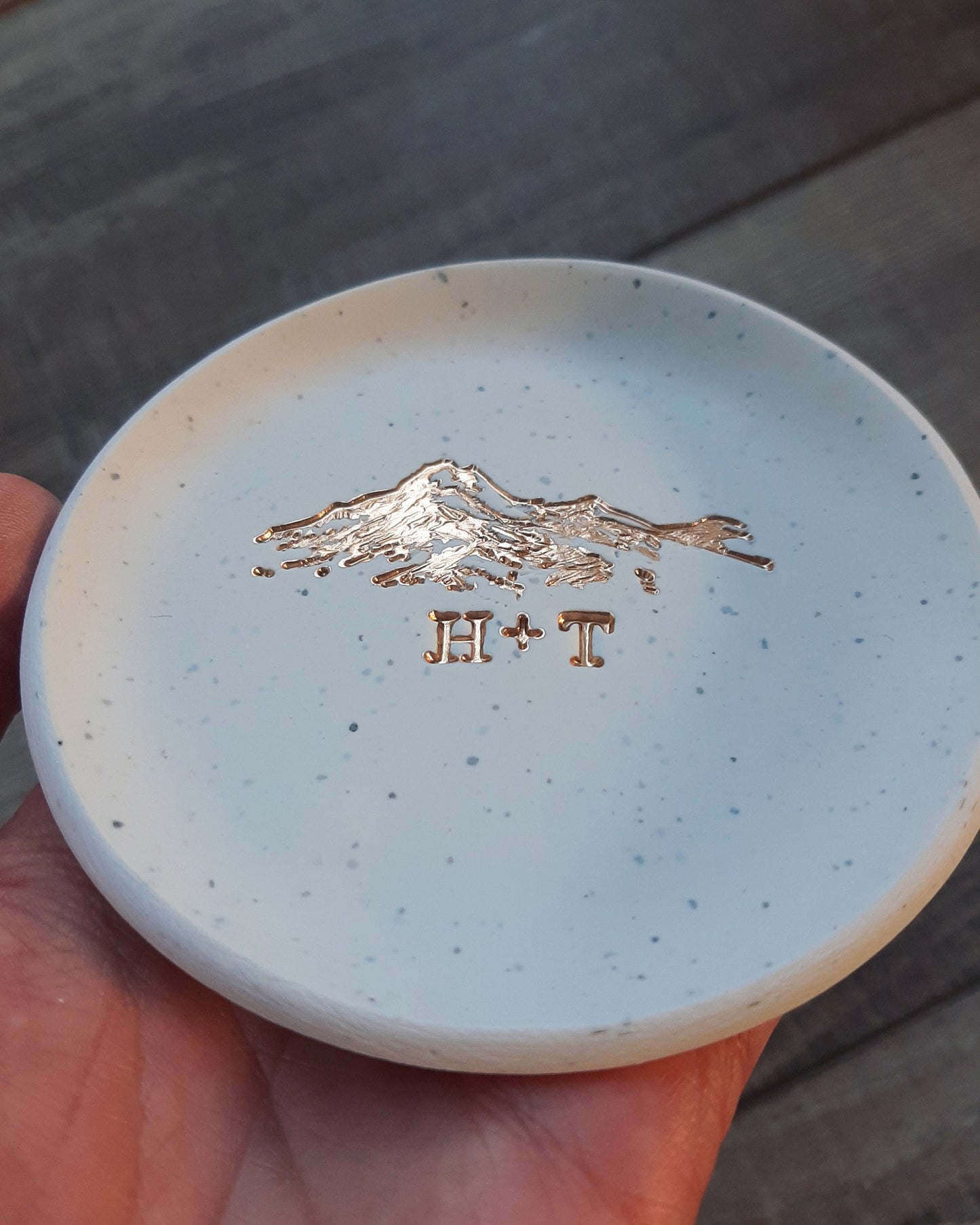 gold foil mountain ring dish with personalized initials for couples