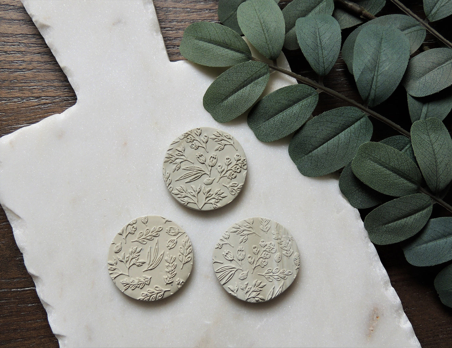 sage green magnet with botanical design