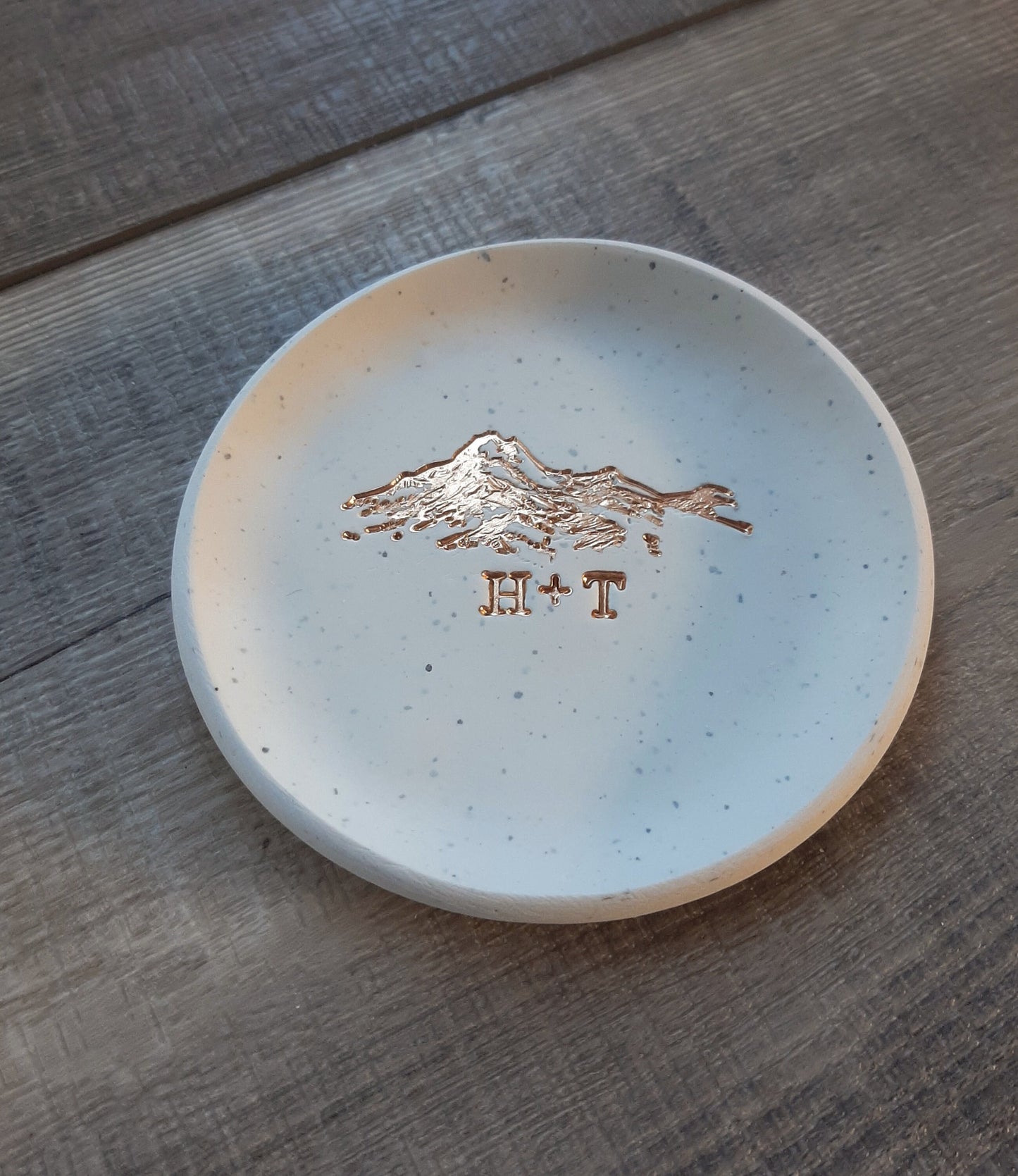 gold foil mountain ring dish with personalized initials for couples