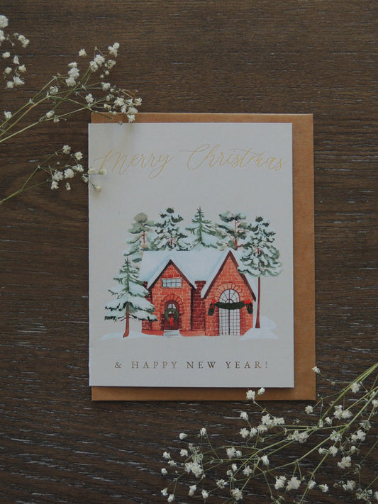 holiday Christmas card with phrase "Merry Christmas and Happy New Year" on front