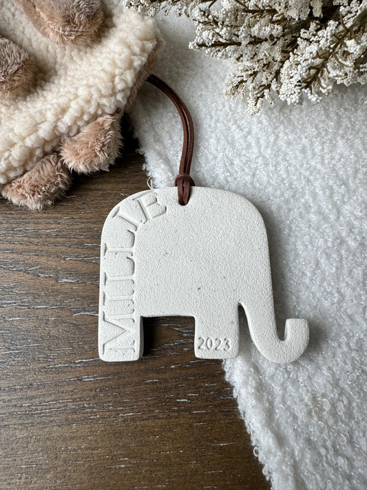 white clay elephant shaped ornament with embossed name, perfect for baby gift