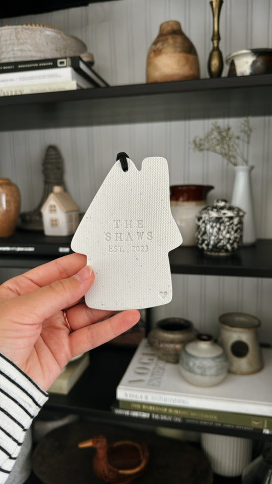 house ornament with custom family name and date in white