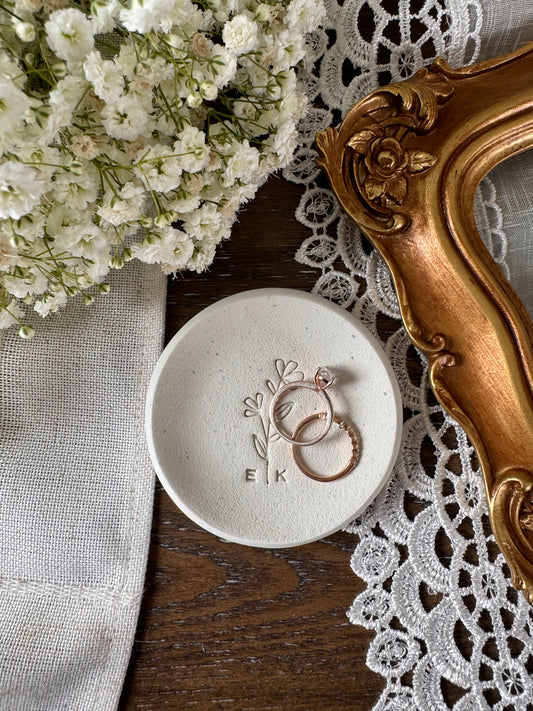white clay ring dish with floral embossed design in center and personalized initials, perfect for brides