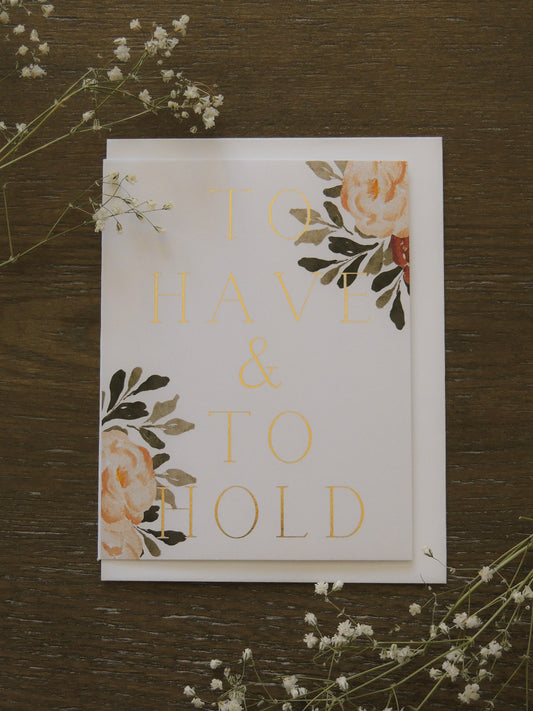 card for couples wedding with phrase 'to have and to hold' on front with floral design