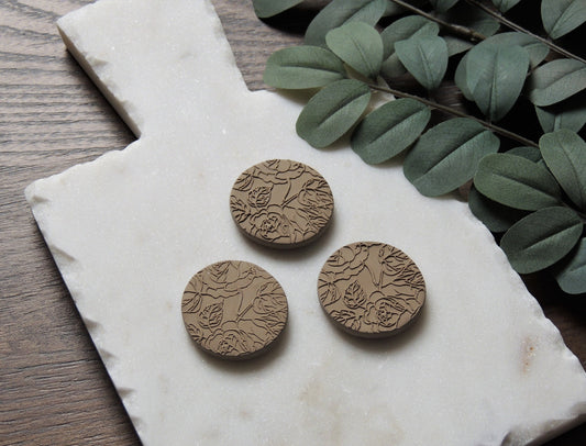 brown clay magnets with boho themed rose print