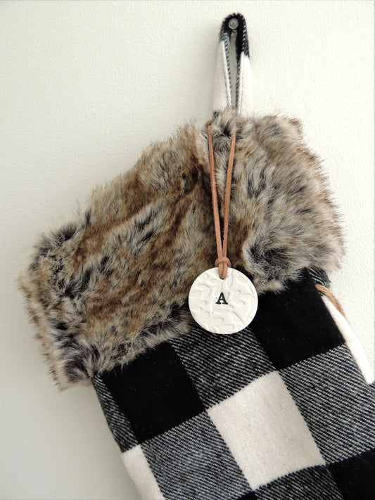 circle tree ornament with letter in center