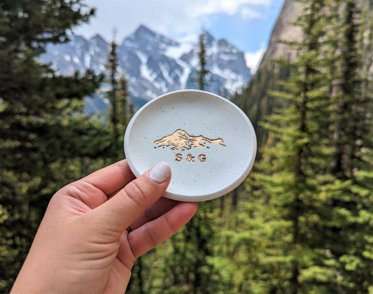 gold foil mountain ring dish with personalized initials for couples