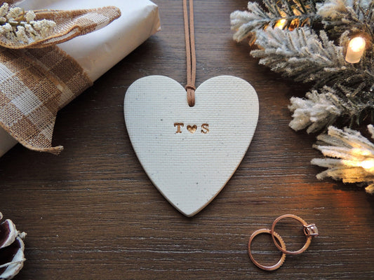 heart shaped ornament with heart and initials for couple
