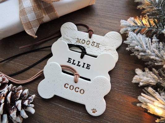 pet ornament in three styles with white and gold writing, black, or rose gold