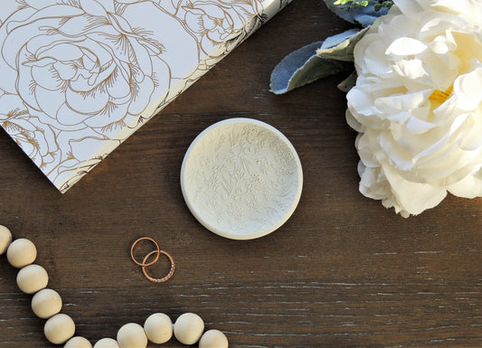 flat lay kit ring dish for wedding photographers with floral lacey pattern