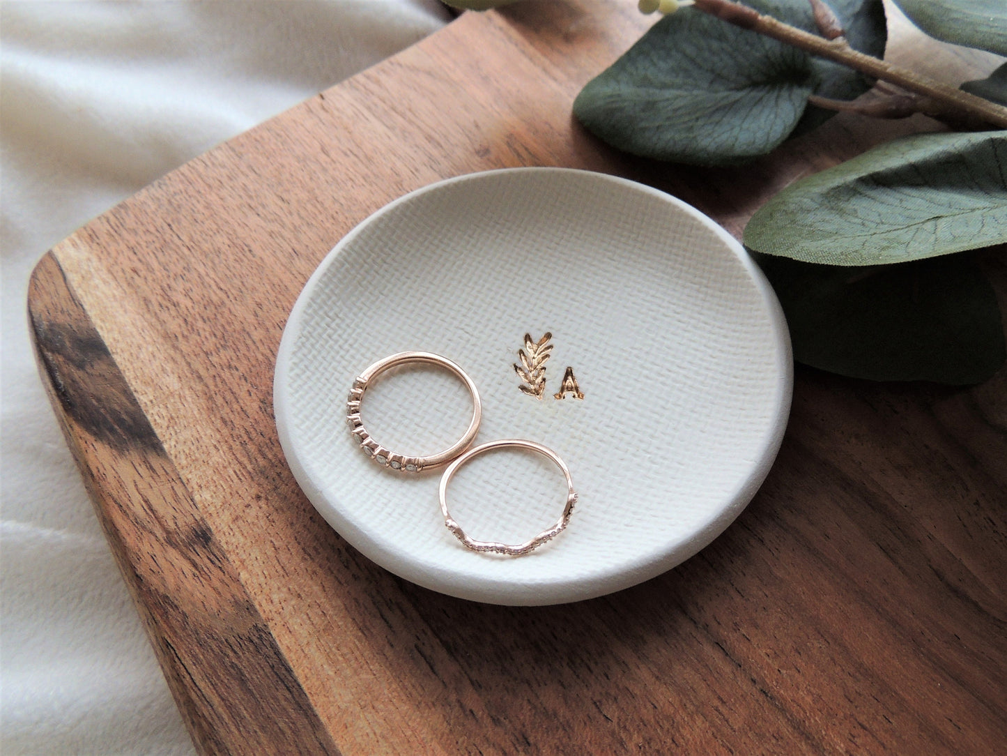 white clay ring dish with gold foil initial and small leaf design, very simple, gift for her