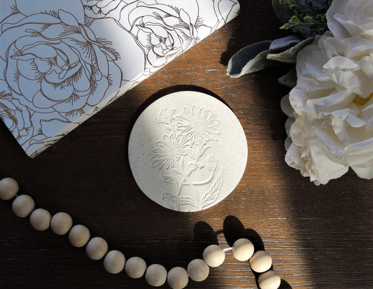 coaster with flower design in white